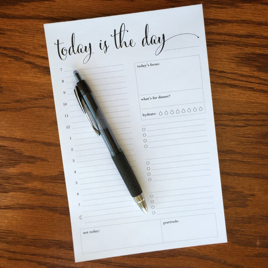 Daily time blocking planner pad with half hourly breakdown